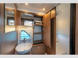 Head with electric toilet and separated shower